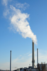 industrial area with smoking chimney