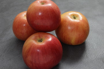 Fototapeta na wymiar Four apples close up.