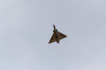 Delta wing fighter plane down front view 