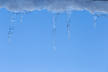 Icicles on building in winter