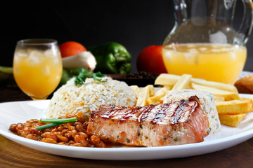 Grilled pork with garnishes