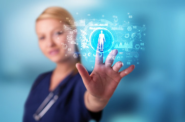 Doctor touching hologram screen displaying medical symbols and charts

