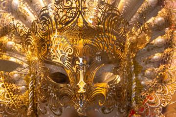 Italy, Venice, carnival 2019, typical Venetian masks and costumes in shop windows and in the street.