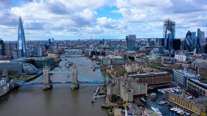 Fototapeta na wymiar Aerial drone photo of iconic Tower Bridge in the heart of City of London, United Kingdom