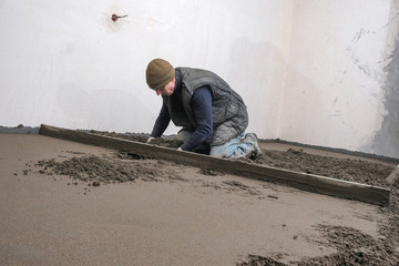 builders poured concrete at the construction site