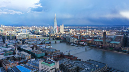 Aerial drone bird's eye view of iconic skyline in City of London, United Kingdom