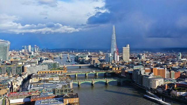 Aerial drone photo of iconic landmark building called "The Shard" in the heart of city of London, United Kingdom