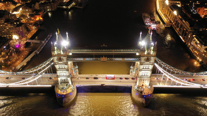 Fototapeta na wymiar Aerial drone high resolution night photo of iconic Tower Bridge in the heart of City of London, United Kingdom