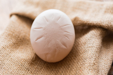 Fototapeta na wymiar hen's egg with marks on the shell
