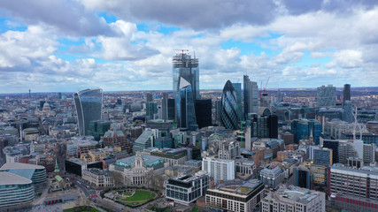Aerial drone panoramic view of iconic financial and bank district with tall skyscrapers in City of London, United Kingdom