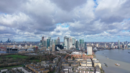 Fototapeta na wymiar Aerial bird's eye panoramic photo taken by drone of iconic Canary Wharf skyscraper complex and business district, Isle of Dogs, London, United Kingdom