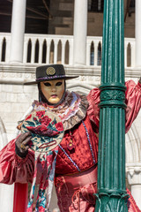 Fototapeta na wymiar Italy, Venice, carnival, 2019, masked people roam the city, posing for photographers and tourists, with beautiful clothes.