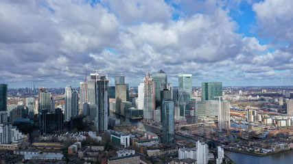 Aerial bird's eye panoramic photo taken by drone of iconic Canary Wharf skyscraper complex and business district, Isle of Dogs, London, United Kingdom