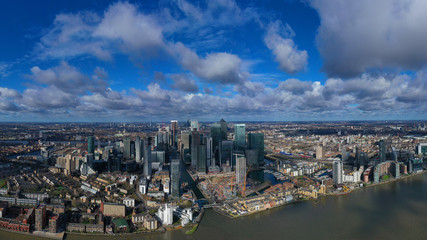 Aerial bird's eye panoramic photo taken by drone of iconic Canary Wharf skyscraper complex and business district, Isle of Dogs, London, United Kingdom