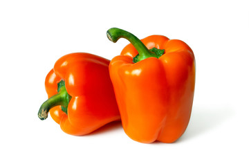 Two orange bell peppers