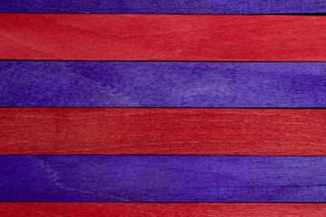 Beautiful texture of natural wood slats in purple and red colors. Natural and aged appearance. Soccer team Barcelona (Barça - Culé)