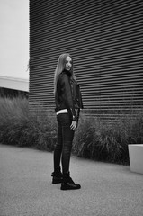 beautiful girl walking in stylish clothes