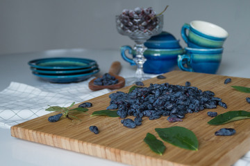 Ripe organic blue honeysuckle raw berries closeup