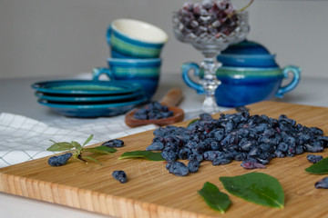 Ripe organic blue honeysuckle raw berries closeup