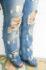 Ripped jeans and a lady