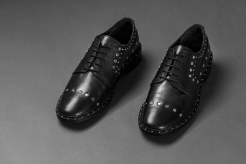 black shoes with rivets