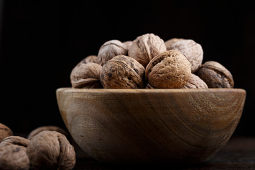 a bunch of walnuts in a bowl