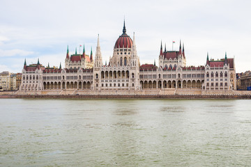 Fototapeta na wymiar Hungarian Parlament building taken from the riverbanks of Danube river in Budapest, Hungary