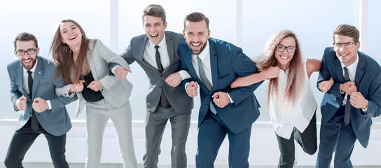 happy business team standing together