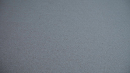 Dark gray cardboard background
