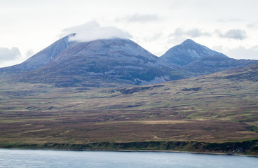 The Paps of Jura, large mountains on the island of Jura in Scotland, are seen from the island of Islay, Scotland.