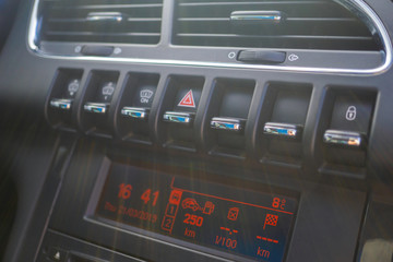 Obraz premium Car conditioner. The air flow inside the car. Detail interior. Air ducts, deflectors on the car panel