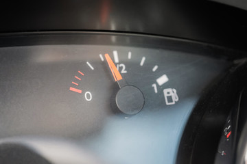 Naklejka premium Fuel indicator. Interior of a modern car