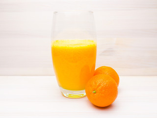 Tangerine citrus juice from mandarins in a clear glass
