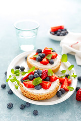 Berry sandwiches with fresh strawberry, blueberry and cream cheese