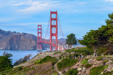 Colorful Golden Gate Bridge and Nature, Trees and Cliffs seen from San Francisco, CA