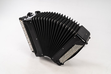 Black accordion on pure white background