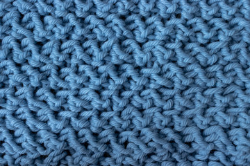 Grey blue messy knitwork close-up
