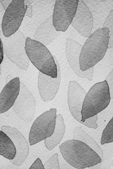 Abstract monochrome watercolor from flying oval leaf shapes in gray background as drops