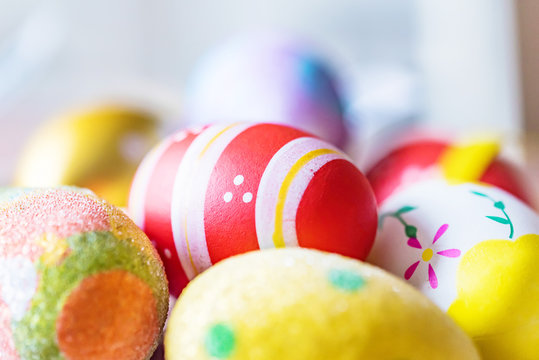 Several colorful Easter eggs close up image
