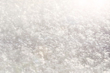 white snow, texture, structure of snowflakes, background