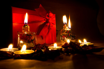 Beautiful candles and gifts burning on Valentine's Day