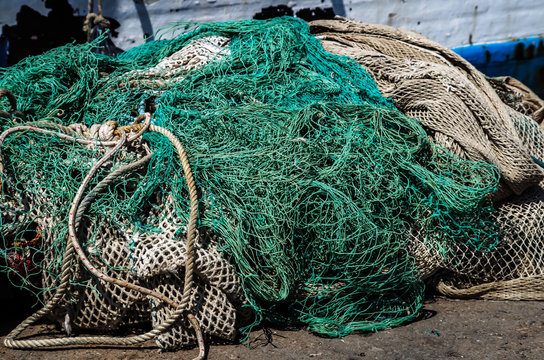 Fishing Net and Fishing Boat Photo