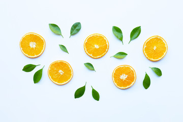 Fresh orange citrus fruit with leaves isolated on white.