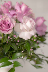 Bouquet of lilac roses and other flowers