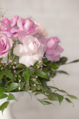 Bouquet of lilac roses and other flowers