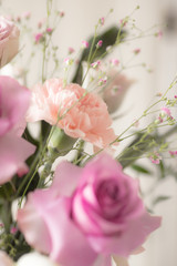 Bouquet of lilac roses and other flowers