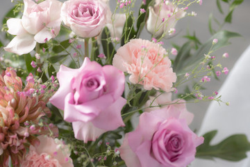 Bouquet of lilac roses and other flowers