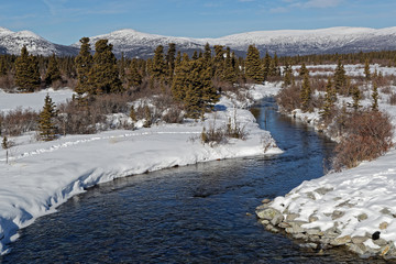 A landscape of river in winter, near Fish Lake, Yukon
