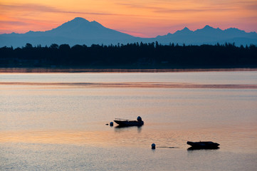 Boats Anchored in the Salish Sea At Sunrise With Mt. Baker in the Background. The view from Lummi...