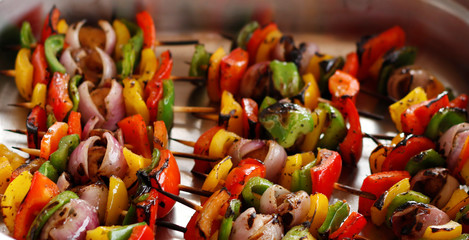 mediterranean grilled vegetable skewers in a serving dish